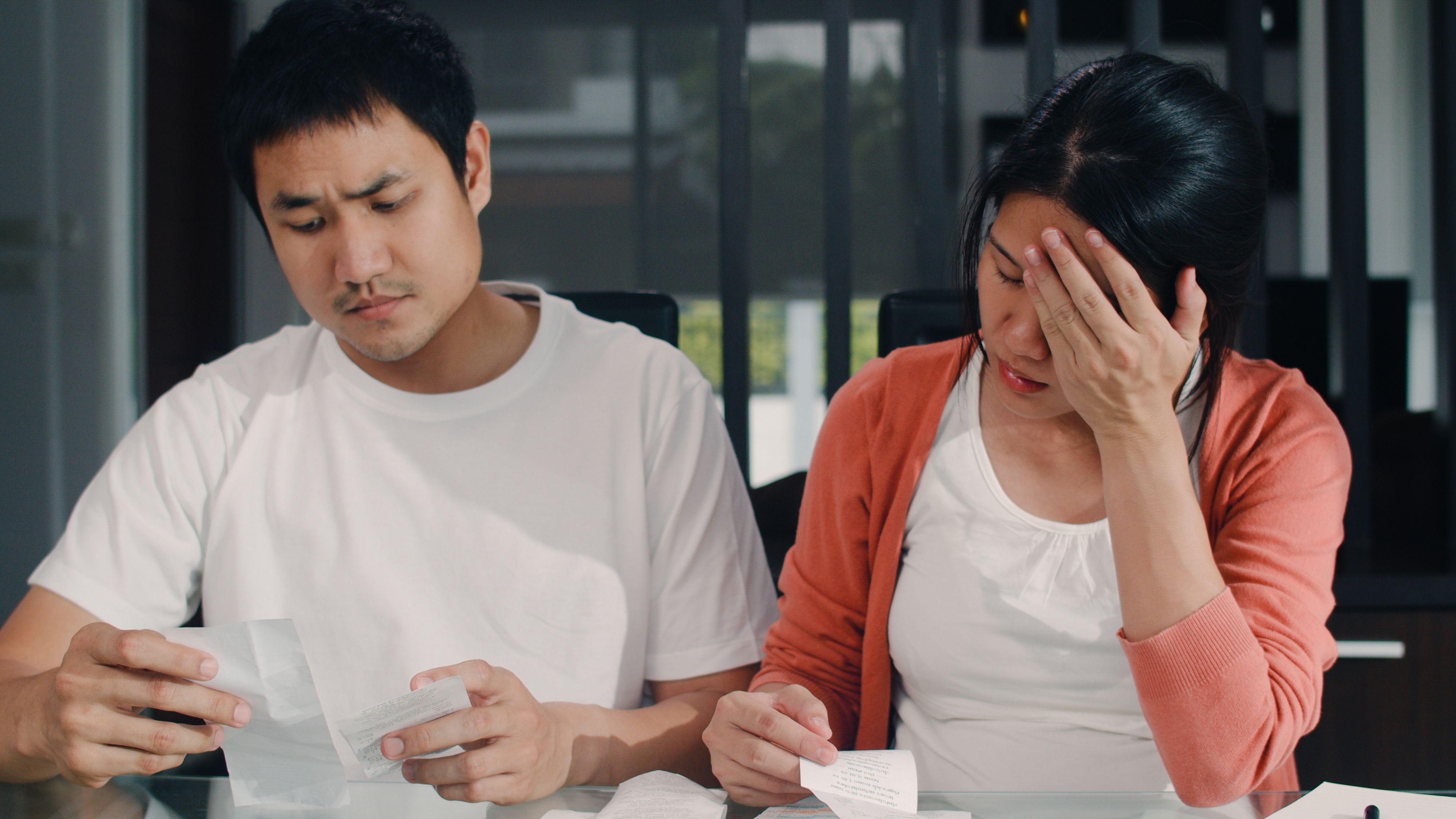 young-asian-pregnant-couple-records-income-expenses-home-mom-worried-serious-stress-while-record-budget-tax-financial-document-working-living-room-home.jpg